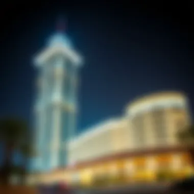 Illuminated Al Reef Tower 1 at Night Night view of Al Reef Tower 1 illuminated, emphasizing its striking architectural features