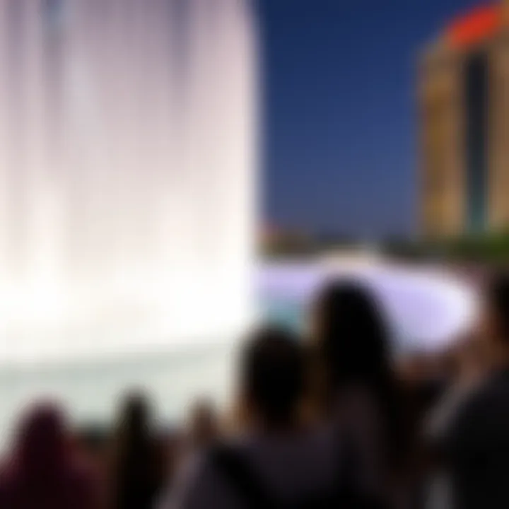 Captivated Spectators at Burj Fountain Audience enjoying the Burj Fountain show