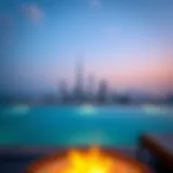 Infinity Pool with Dubai Skyline Stunning view of an infinity pool overlooking the Dubai skyline