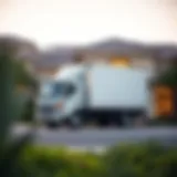 Moving truck parked in front of a house