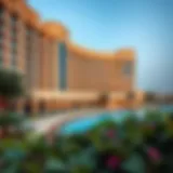 Architectural Elegance of Mövenpick Oud Metha A panoramic view of Mövenpick Oud Metha showcasing its architectural beauty